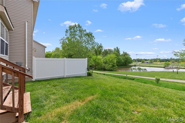 view of yard with a water view