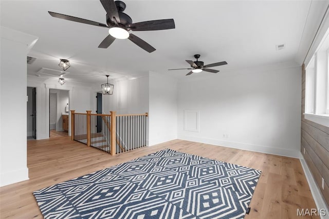 601 Foote Ave, Webster Groves, MO 63119 - unfurnished room featuring ceiling fan, light wood-style floors, baseboards, and attic access