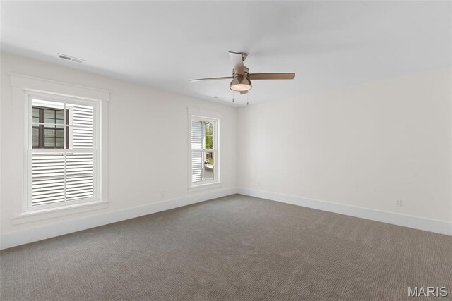 601 Foote Ave, Webster Groves, MO 63119 - carpeted spare room with baseboards and a ceiling fan