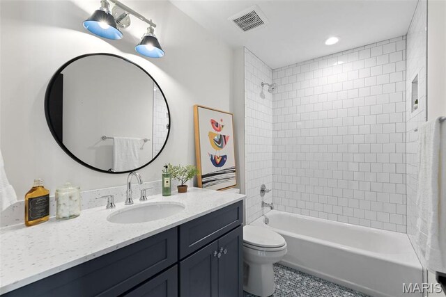 601 Foote Ave, Webster Groves, MO 63119 - bathroom featuring tile patterned floors, toilet, tub / shower combination, vanity, and recessed lighting