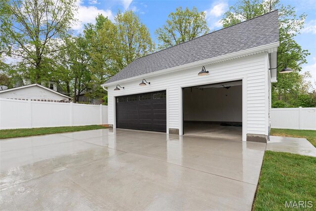 601 Foote Ave, Webster Groves, MO 63119 - garage featuring concrete driveway and fence