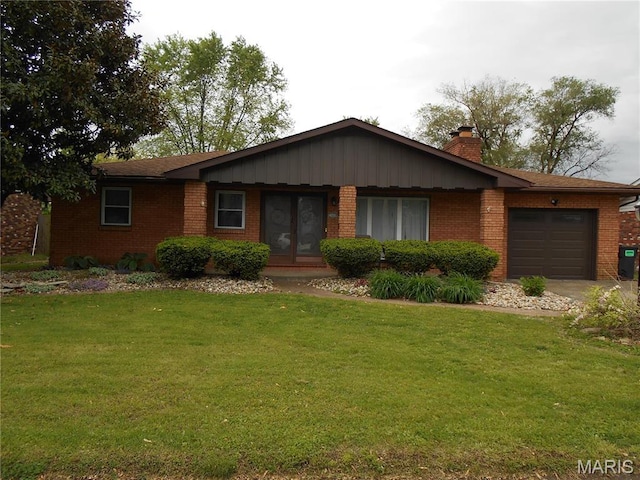 2408 Morrison Rd, Granite City, IL 62040 - ranch-style house with brick siding, an attached garage, and a front yard