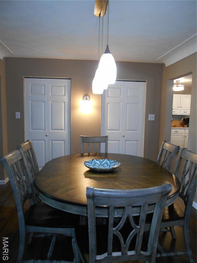 2408 Morrison Rd, Granite City, IL 62040 - dining room featuring baseboards and wood finished floors