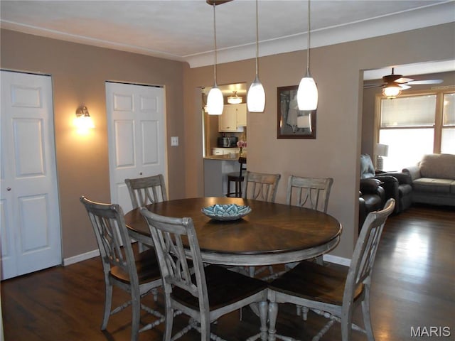 2408 Morrison Rd, Granite City, IL 62040 - dining area with dark wood finished floors, baseboards, and ceiling fan