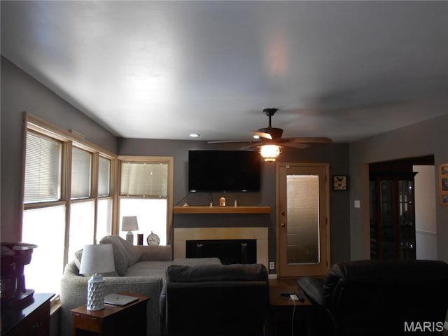2408 Morrison Rd, Granite City, IL 62040 - living room with ceiling fan and a glass covered fireplace