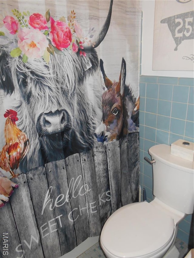 2408 Morrison Rd, Granite City, IL 62040 - bathroom with tile walls, toilet, and wainscoting