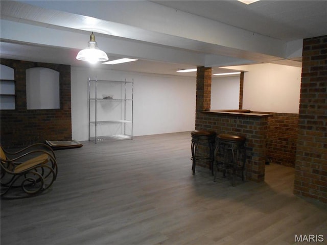2408 Morrison Rd, Granite City, IL 62040 - sitting room featuring a bar, wood finished floors, and beamed ceiling
