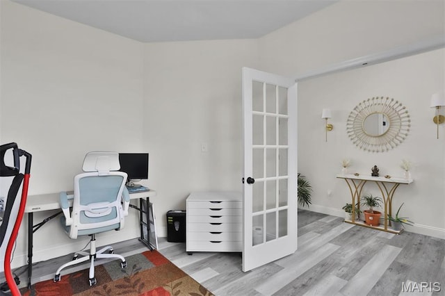 112 Westhaven View Dr, Wentzville, MO 63385 - home office featuring french doors, wood finished floors, and baseboards