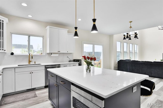 112 Westhaven View Dr, Wentzville, MO 63385 - kitchen featuring a sink, stainless steel appliances, healthy amount of natural light, light wood-style flooring, and recessed lighting