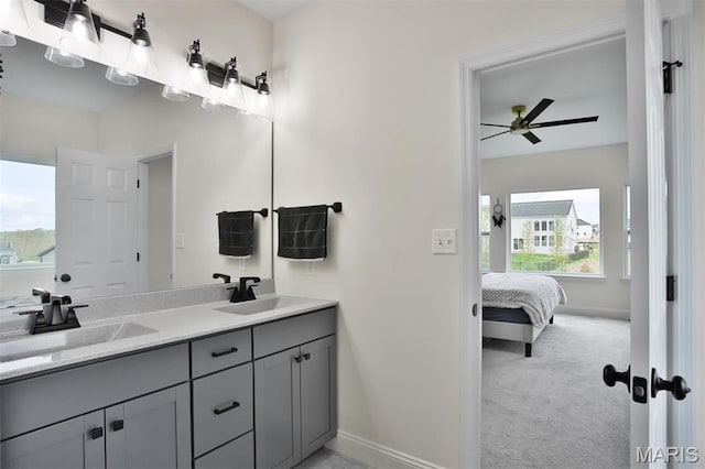 112 Westhaven View Dr, Wentzville, MO 63385 - ensuite bathroom featuring baseboards, ceiling fan, and double vanity