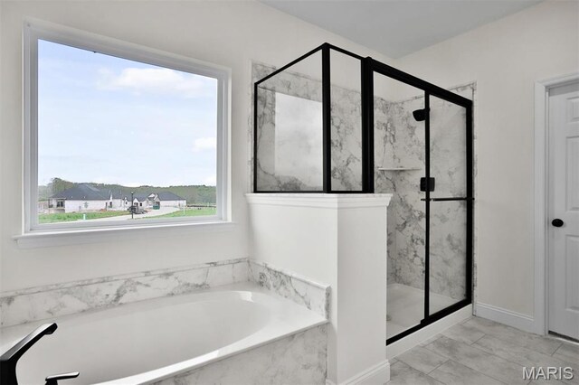 112 Westhaven View Dr, Wentzville, MO 63385 - full bathroom featuring a marble finish shower and a garden tub