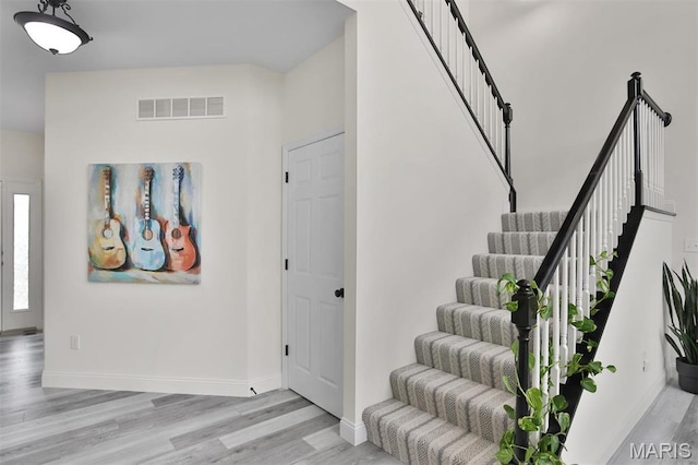 112 Westhaven View Dr, Wentzville, MO 63385 - foyer featuring wood finished floors, stairs, and baseboards