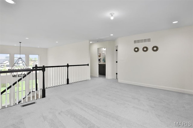 112 Westhaven View Dr, Wentzville, MO 63385 - carpeted spare room with recessed lighting, a chandelier, and baseboards