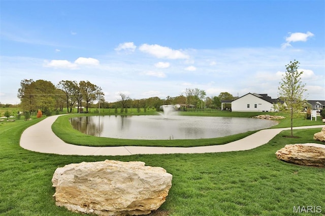 112 Westhaven View Dr, Wentzville, MO 63385 - view of home's community with a water view and a lawn