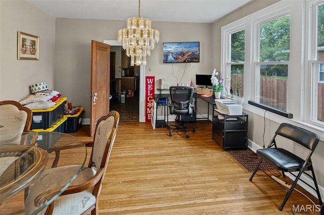 113 Orchard Dr, Belleville, IL 62221 - office space featuring light wood finished floors, a chandelier, and baseboards