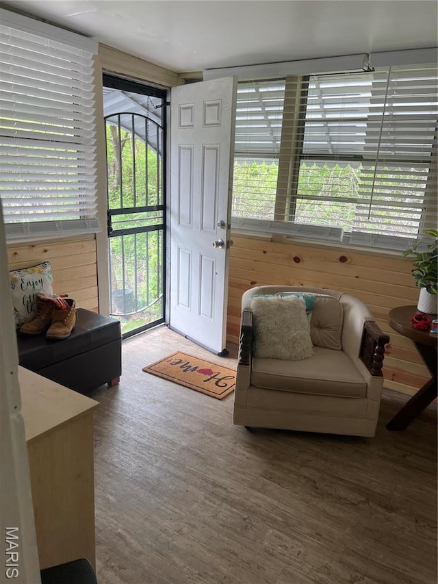 7401 Pleaseway Dr, Saint Louis, MO 63136 - living room featuring wood finished floors and healthy amount of natural light