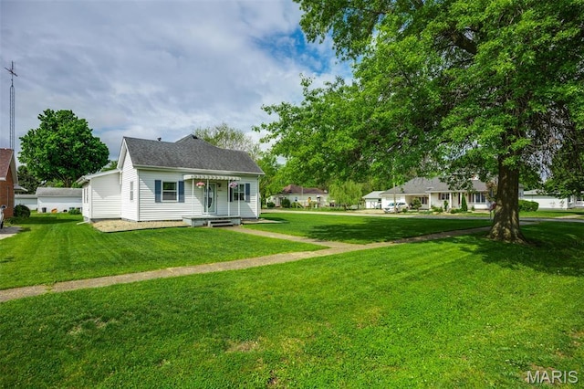 view of front of house with a front lawn