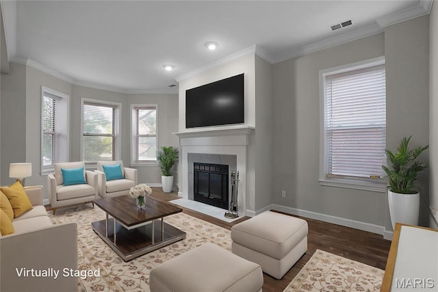 4250 Lindell Blvd Unit A, Saint Louis, MO 63108 - living room with wood finished floors, a glass covered fireplace, baseboards, ornamental molding, and recessed lighting
