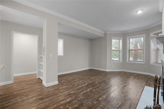4250 Lindell Blvd Unit A, Saint Louis, MO 63108 - unfurnished living room featuring dark wood-style flooring, baseboards, and ornamental molding