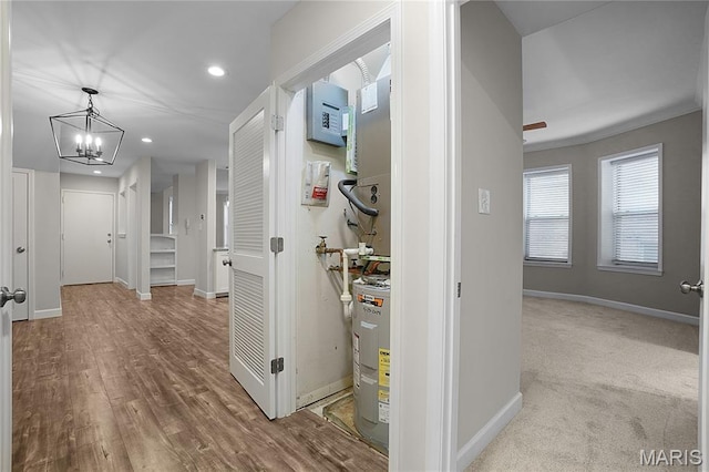 4250 Lindell Blvd Unit A, Saint Louis, MO 63108 - corridor with recessed lighting, a chandelier, water heater, baseboards, and wood finished floors