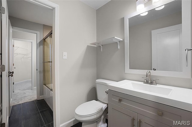 4250 Lindell Blvd Unit A, Saint Louis, MO 63108 - full bathroom featuring toilet, vanity, baseboards, and bath / shower combo with glass door