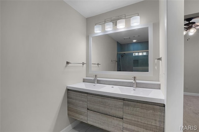 4250 Lindell Blvd Unit A, Saint Louis, MO 63108 - bathroom featuring baseboards, a shower stall, double vanity, and ceiling fan