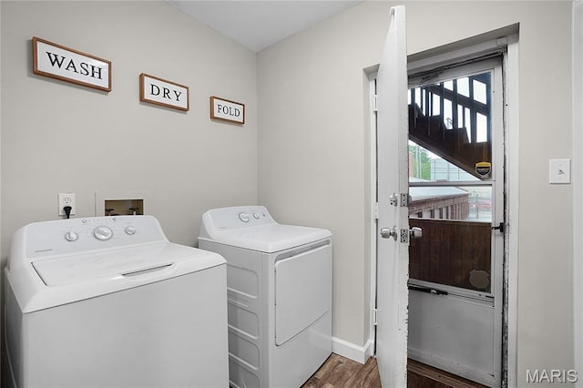 4250 Lindell Blvd Unit A, Saint Louis, MO 63108 - laundry room with washer and dryer, wood finished floors, and baseboards