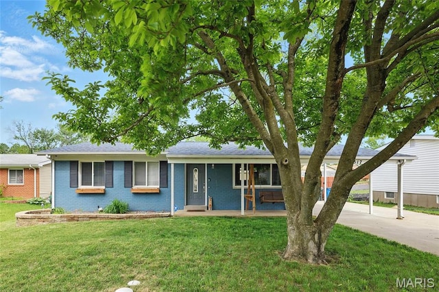 ranch-style home with brick siding, a front lawn, concrete driveway, and a porch