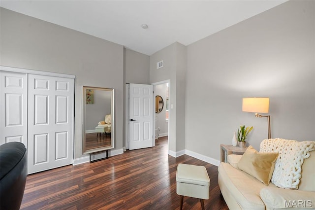 2005 Arsenal St, Saint Louis, MO 63118 - living area featuring dark wood finished floors, baseboards, and a towering ceiling