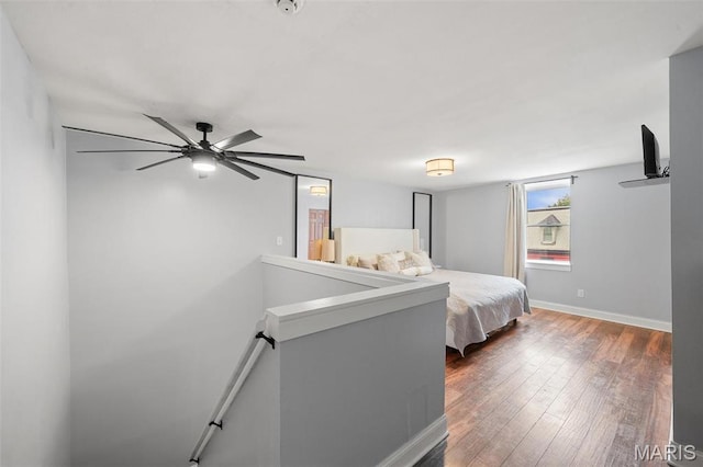 2005 Arsenal St, Saint Louis, MO 63118 - bedroom featuring hardwood / wood-style flooring, baseboards, and ceiling fan