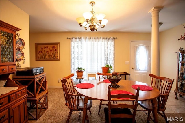 1014 Pine St, Sikeston, MO 63801 - dining area with a chandelier and decorative columns