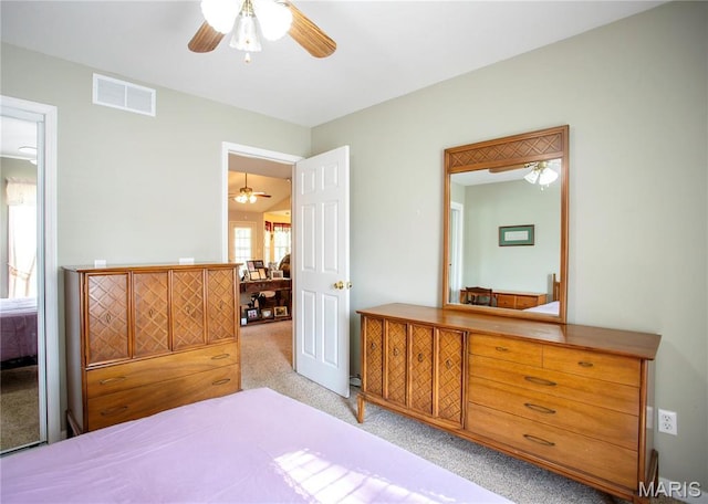 1014 Pine St, Sikeston, MO 63801 - bedroom with carpet and a ceiling fan