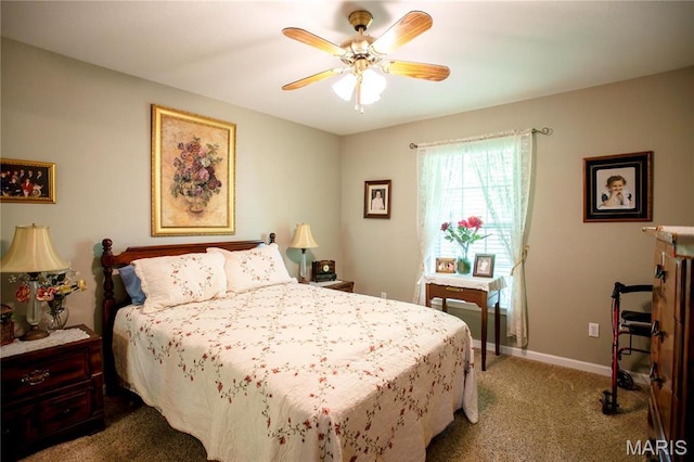 1014 Pine St, Sikeston, MO 63801 - bedroom with carpet, a ceiling fan, and baseboards