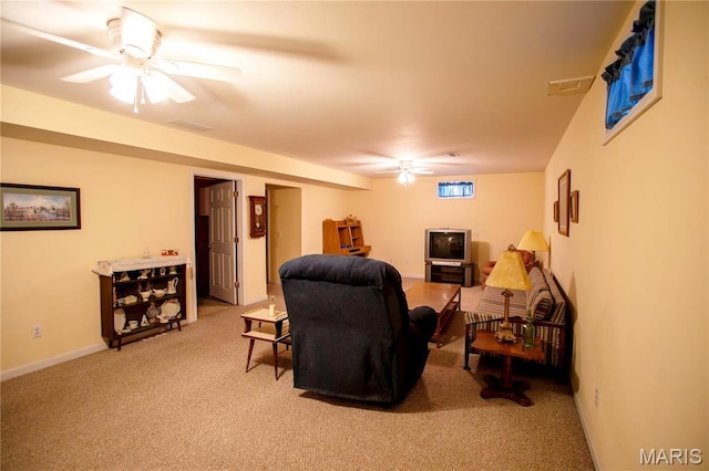 1014 Pine St, Sikeston, MO 63801 - living room with light carpet, ceiling fan, and baseboards