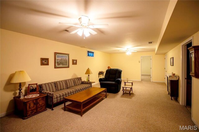 1014 Pine St, Sikeston, MO 63801 - living room featuring ceiling fan, light colored carpet, and baseboards