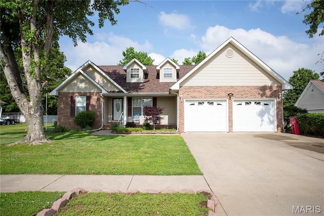 1014 Pine St, Sikeston, MO 63801 - view of front facade with brick siding, a garage, a front lawn, concrete driveway, and a porch