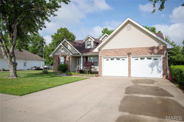 1014 Pine St, Sikeston, MO 63801 - view of front facade with brick siding, concrete driveway, a front yard, and an attached garage