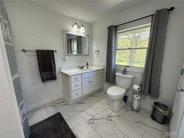 17260 Carver Dr, New London, MO 63459 - full bath featuring marble finish flooring, baseboards, vanity, and toilet