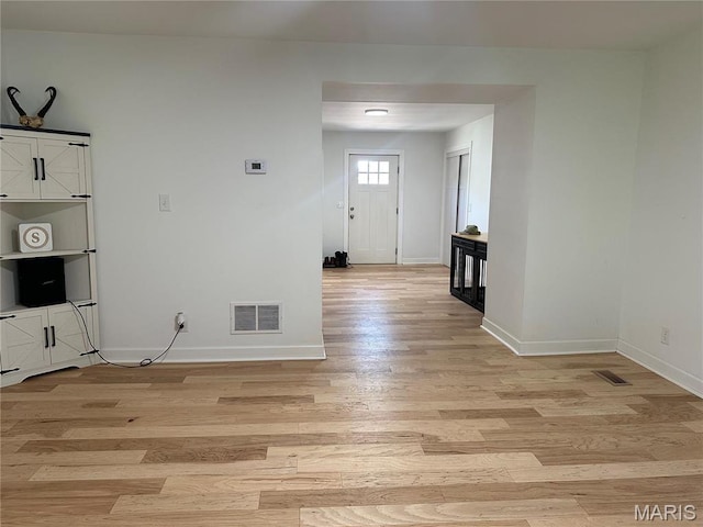 17260 Carver Dr, New London, MO 63459 - spare room featuring light wood finished floors and baseboards