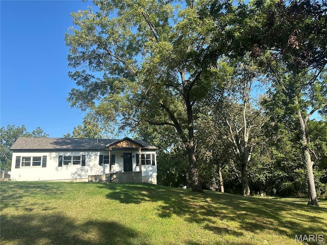 17260 Carver Dr, New London, MO 63459 - view of front of house with a front lawn