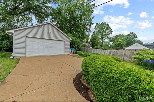 detached garage with fence