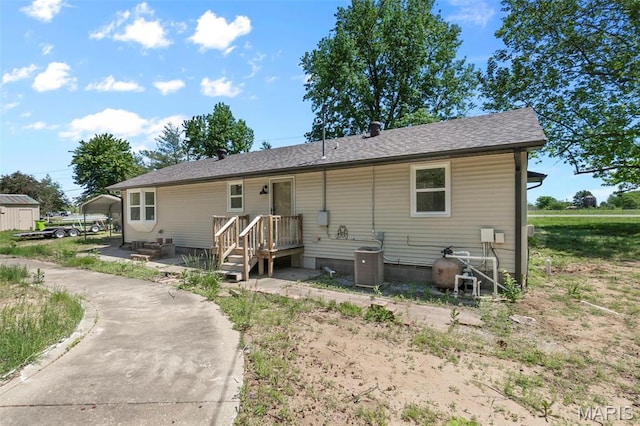 2047 State Highway H, Sikeston, MO 63801 - back of property featuring central AC unit