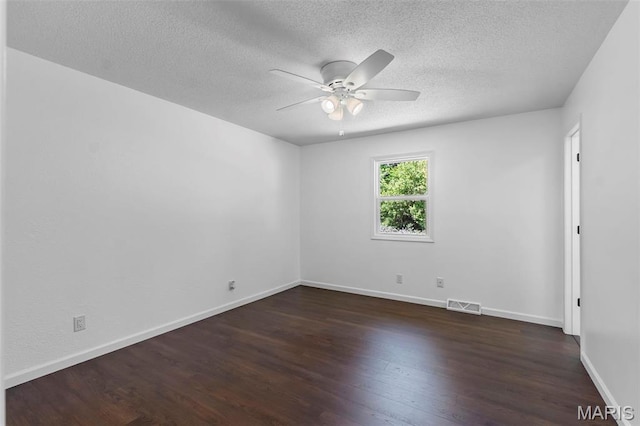 2047 State Highway H, Sikeston, MO 63801 - unfurnished room with ceiling fan, wood finished floors, a textured ceiling, and baseboards