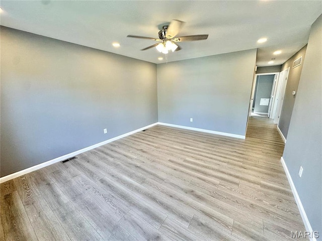 2944 Advance Dr, Florissant, MO 63031 - unfurnished room featuring a ceiling fan, wood finished floors, recessed lighting, and baseboards