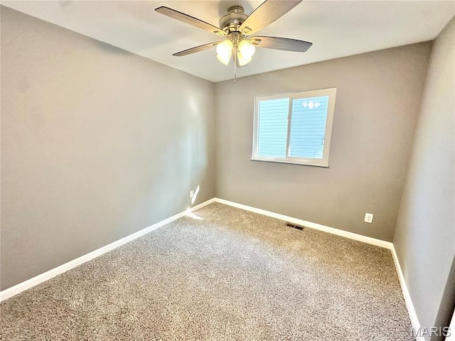 2944 Advance Dr, Florissant, MO 63031 - carpeted spare room featuring a ceiling fan and baseboards