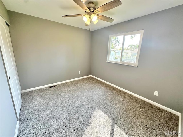 2944 Advance Dr, Florissant, MO 63031 - empty room featuring carpet, ceiling fan, and baseboards