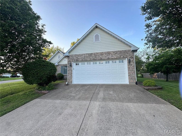 511 Log Cabin Rd, Farmington, MO 63640 - view of front of property with brick siding, concrete driveway, and a garage