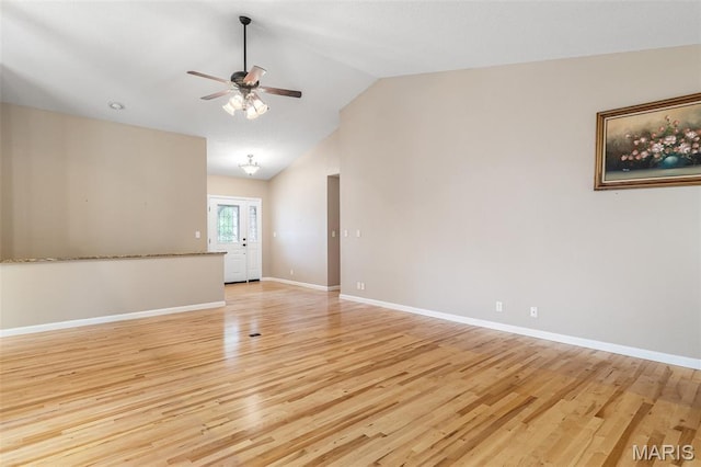 511 Log Cabin Rd, Farmington, MO 63640 - unfurnished living room with a ceiling fan, light wood-style flooring, lofted ceiling, and baseboards