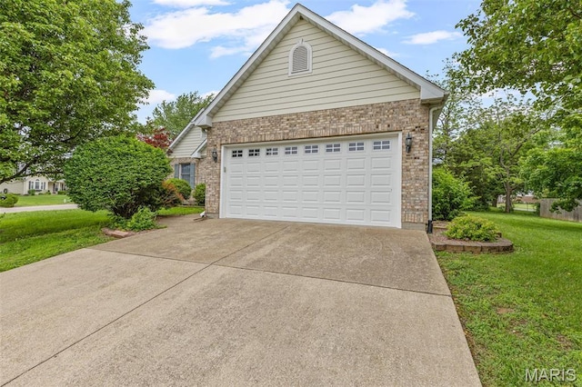511 Log Cabin Rd, Farmington, MO 63640 - garage featuring concrete driveway
