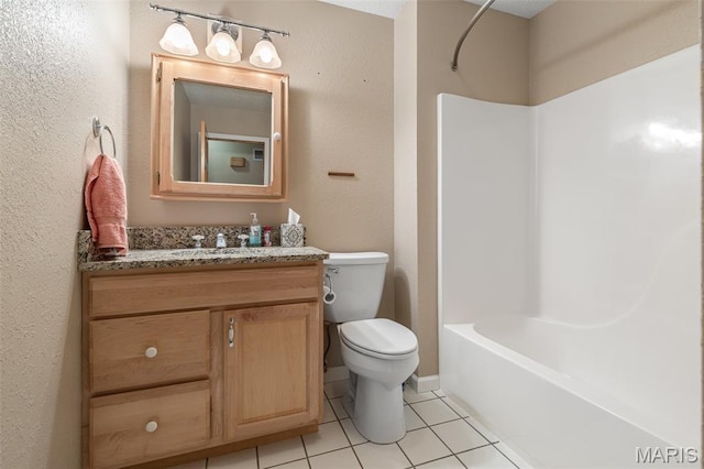 511 Log Cabin Rd, Farmington, MO 63640 - bathroom featuring tile patterned floors, toilet, vanity, and bathing tub / shower combination